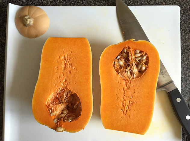 Oven-roasted butternut squash halves -- slice in half, scoop out seeds, brush with oil, place face down on baking tray, and bake 